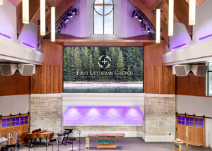 The First Lutheran Church of Fargo, ND engaged WSDG to develop an acoustic and sound isolation program for their newly constructed Celebration Center. Stage View.
