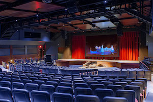 Goshen High School new auditorium in Goshen, NY. WSDG was retained to acoustically measure the space and collaborate on the redesign with LAN Associates to optimize the space for these needs while still retaining the aesthetic goals of the redesign. Front side view.