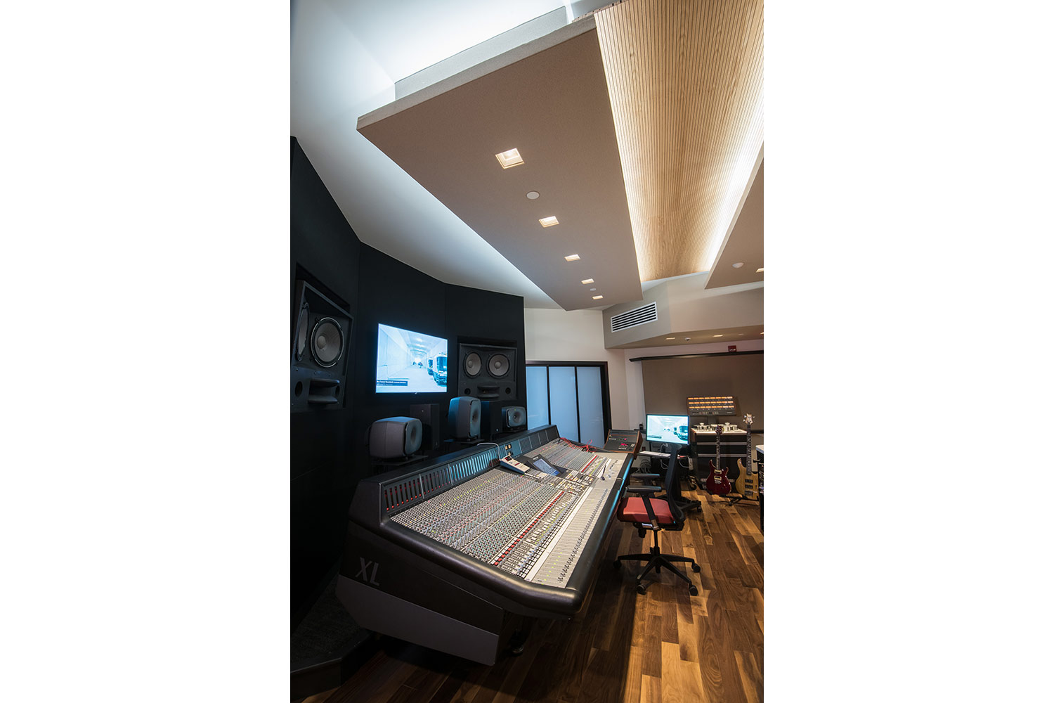 Montgomery County Community College in Blue Bell, PA brand-new Recording Studio for their Digital Music Technology course. Designed by WSDG. Architectural acoustics and media systems engineering. Control Room vertical view.