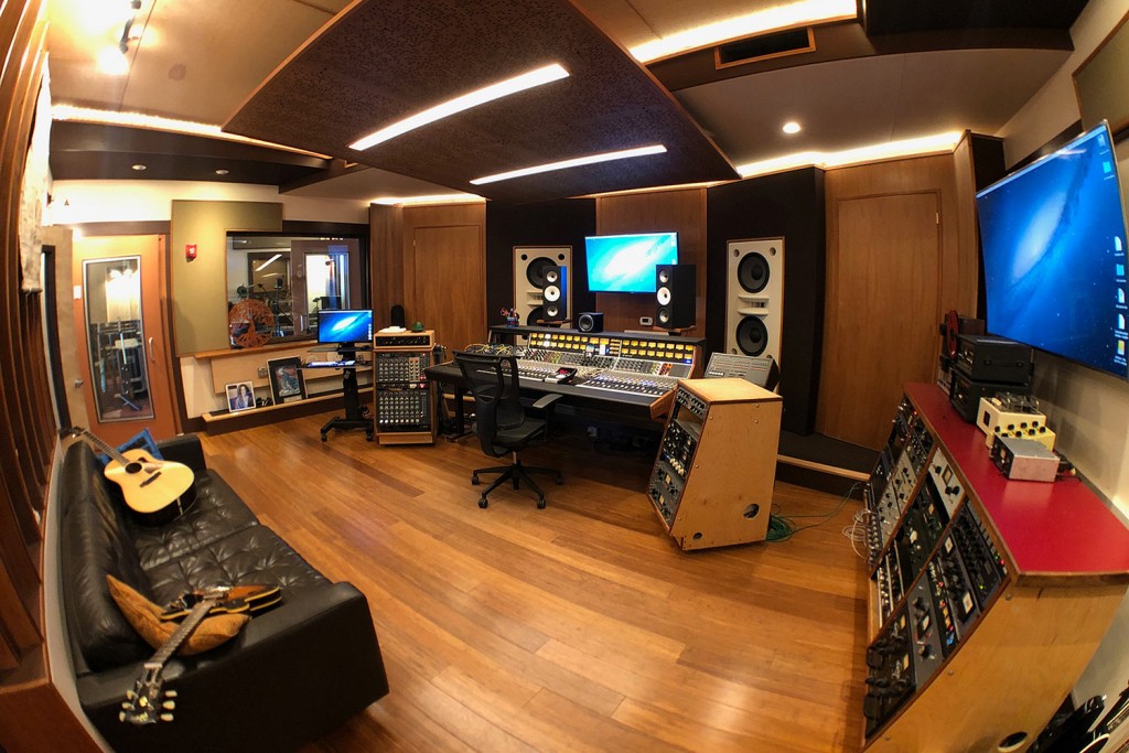 Gear guru studio owner PK Pandey Mad Oak Studios. Beautiful Control Room with Symphonic Acoustics custom speakers. WSDG was the only recording studio design firm considered for this project. Control Room right side view.