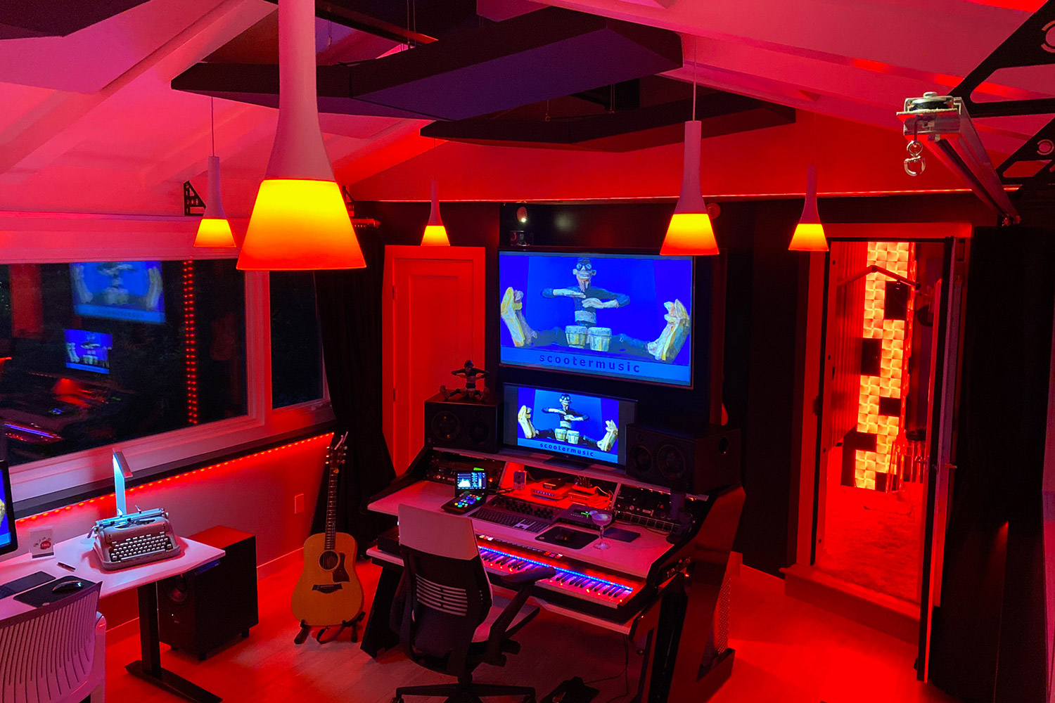 Multi-talented Scooter Pietsch conceived a professionally designed CR/Recording/Mixing room and retained WSDG to design his new studio. Control Room red.