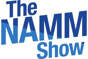 The Namm Show Logo. WSDG giving a lecture.